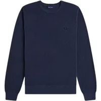 Navy blue Fred Perry pique knit jumper with ribbed cuffs and hem, featuring an embroidered laurel wreath logo on the chest.