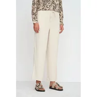 Cream-colored tapered trousers for women, featuring a drawstring waist and relaxed fit.