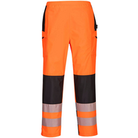 Orange and black Portwest PW3 ladies rain trousers with reflective stripes and side pockets, size L.