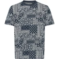 Navy blue printed T-shirt with intricate white paisley and geometric patterns, short sleeves, and crew neckline.