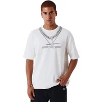 White Project X Paris T-shirt featuring a printed chain design on the chest, worn by a model with short sleeves.