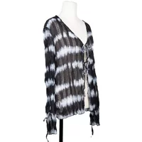 Black and white tie-dye blouse with V-neck and front tie detail, long sleeves, by 24 Colours.