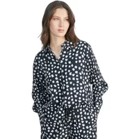 Printed women's shirt by 24 Colours, black with white abstract pattern, button-up, long sleeves.