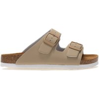 Cream Regatta Mia infant sandals with double buckle straps, cork footbed, and white sole.