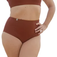 Reversible women's bikini bottom in rust color, high-waisted with a smooth finish, paired with matching top.