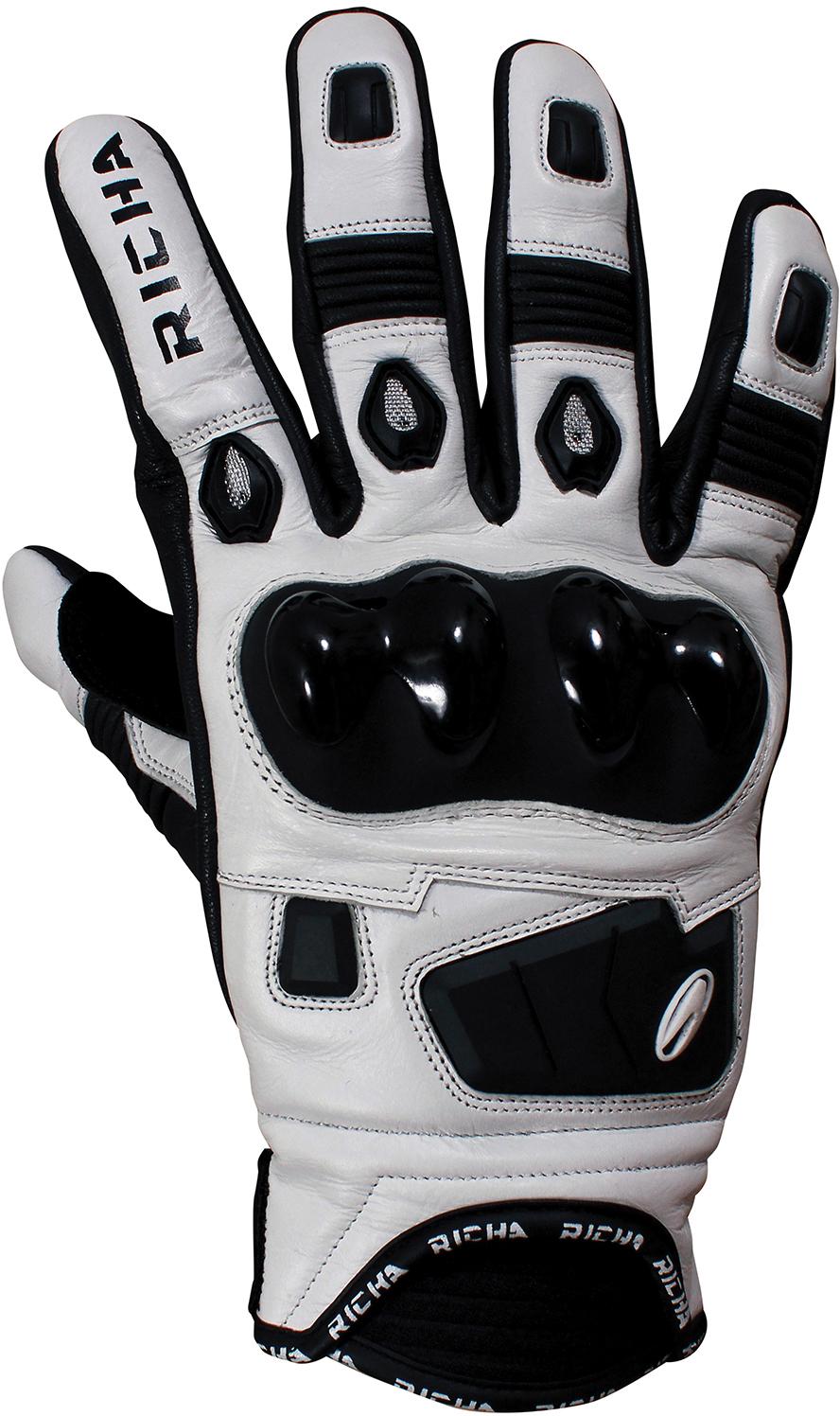 Black and white Richa motorcycle glove with knuckle protectors and adjustable wrist strap.