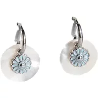 Round drop earrings with silver hoops, white discs, and small blue flower charms.