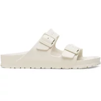 Beige Birkenstock Arizona Essentials EVA sandals with dual adjustable straps and contoured footbed.
