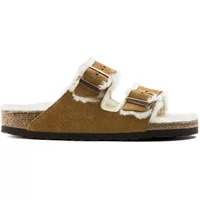 Birkenstock Arizona sandals in mink with shearling lining, two adjustable straps, and cork-latex footbed.