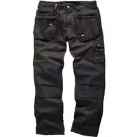 Black Scruffs Worker Plus 30R trousers with multiple pockets, reinforced knees, and orange accents.