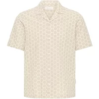 Beige short-sleeve button-up shirt with hexagonal pattern and open collar.