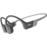 Grey Shokz OpenRun sports headphones with open-ear design and flexible neckband.