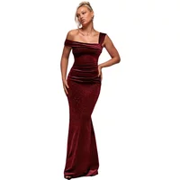 Burgundy velvet maxi dress with sparkly polka dots, off-shoulder design, and fitted silhouette by Goddiva.