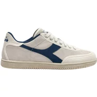 White and blue Diadora suede trainers with a gum sole and logo on the side.