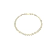 Gold-tone plated Swarovski necklace with round-cut white crystals in a tennis design.