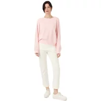 Pink Artlove Alione sweatshirt, long sleeves, relaxed fit, worn by a model with white pants and sneakers.