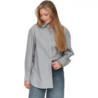 Gray tailored women's shirt with long sleeves and button-up front, worn by model with light blue jeans.