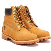 Wheat-colored Timberland men's boots with padded collar, metal eyelets, and rugged rubber sole.