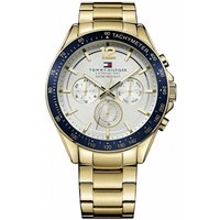 Gold Tommy Hilfiger men's watch with blue tachymeter bezel, white dial, and link bracelet.