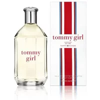 Clear glass bottle of Tommy Girl Eau De Toilette, silver cap, red text, next to white box with red and blue stripes.