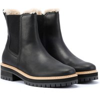 Black leather women's ankle boots with shearling lining, elastic side panels, and chunky rubber soles.