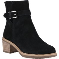 Black leather heeled ankle boots with buckle strap and stacked heel by TOMS.
