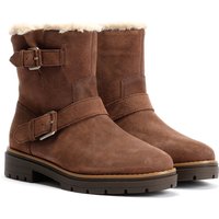 Dark brown suede women's boots with fur lining, buckle straps, and rugged sole.