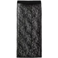 Transparent lace skirt with black floral pattern and straight silhouette by Sofie Schnoor Calinasw.