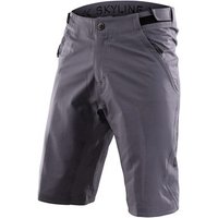 Gray Troy Lee Designs Skyline MTB cycling shorts with adjustable waistband and zippered pockets.
