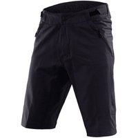 Black Troy Lee Designs Skyline MTB shorts with zippered pockets and adjustable waistband.