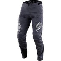 Gray Troy Lee Designs Sprint MTB trousers with reinforced knees, white logos, and black ankle cuffs.