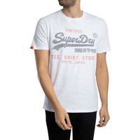 White Superdry Vintage Logo Heritage T-Shirt with gray and orange text, relaxed fit, short sleeves.