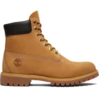 Timberland Premium 6 waterproof ankle boots in wheat color with black padded collar and rugged rubber sole.