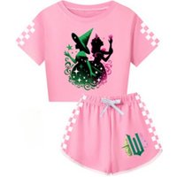 Pink Wicked T-shirt and shorts set with green witch print, checkered sleeves, and matching logo on shorts.
