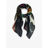 Colorful Desigual Lacroix foulard with abstract patterns in black, green, and red tones.