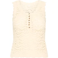 Cream lace sleeveless sweater with scalloped edges and front button detailing by Atelier Rêve Irestella.