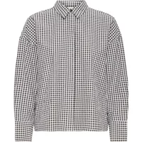 Black and white checkered Ichi Parker woman's shirt with long sleeves and a pointed collar.