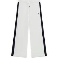 White women’s jogging trousers with black side stripes and drawstring waist by Guess.