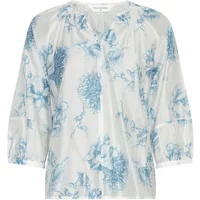 White 3/4 sleeve blouse by Moss Copenhagen with blue floral print and gathered neckline.