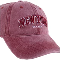 Pink women's baseball cap with "New York EST. 1625" embroidered in red and white on the front.