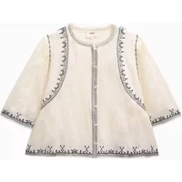 Cream Artlove Melisca blouse with black embroidered trim and three-quarter sleeves.