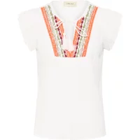 Cream Wilja women's blouse with short sleeves, colorful embroidered V-neck, and tassel ties.