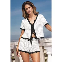 White textured Cupshe blouse with black scalloped trim, short sleeves, and front tie closure.