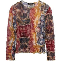 Colorful Desigual Lacroix women's blouse with abstract patchwork design in red, yellow, and blue tones.