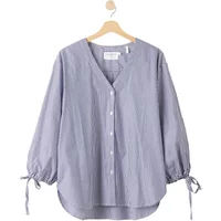 Blue and white striped Holebrook Marie women's blouse with V-neck, button front, and tie-cuff balloon sleeves.