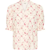 Cream Ichi Ane women's blouse with pink floral print, V-neck, and short puff sleeves with ruffled cuffs.