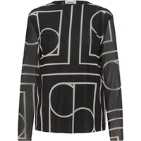 Black Soaked in Luxury SLAvetta women's blouse with geometric white pattern and long sleeves.