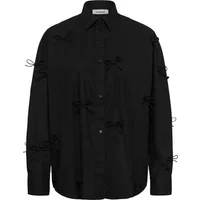 Black women's blouse by Soaked in Luxury with button front and decorative bow details.