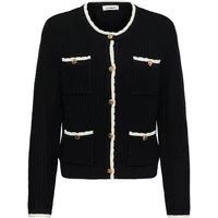 Black women's cardigan with white trim, gold buttons, and front pockets by Soaked in Luxury Nobilo.