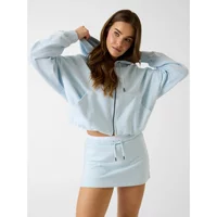 Light blue women's crop hoodie by Guess with front zipper and drawstring hood.
